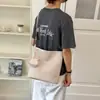 Bolso de Gran Capacidad con Textura Tejida para Mujer 2026 Nuevo Bolso Cubo Pequeño de Nicho de Gama Alta Bolso Cruzado Trendy Casual para el Trabajo