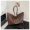 Bolsa de grande capacidade transfronteiriça feminina primavera e verão all-match 2025 nova bolsa de ombro retrô de couro macio bolsa de viagem casual