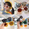 Estilo coreano ins nuevas gafas de sol a prueba de sol para niños gafas de sol al por mayor adelgazantes de moda trendy gafas retro para bebés niñas