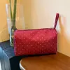 Bolso de mano de lunares versátil estilo ins, bolsa para maquillaje, bolsa de almacenamiento ligera y de gran capacidad, conveniente para viajar y fácil de llevar