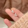 Nuevos aretes de plata pura s925 en forma de corazón para mujer, versátiles para el uso diario, modernos, de nicho, lujo ligero 2026, aretes sin perforación para mujer