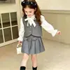 Conjunto de Otoño Rantuo para Niñas 2026 Nuevo Infantil Dulce Chaleco Multicolor Camisa Falda Corta Conjunto de Tres Piezas Transfronterizo