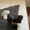 Bolso tipo almohada de moda nicho estilo coreano versátil para mujer 2026 Nuevo modelo de alta gama ligero para el trabajo diario bandolera cruzada