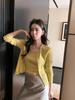 Moda de Hong Kong y Americana/Conjunto de Atuendo Ootd Verano 2026 para Mujeres: Conjunto de Dos Piezas: Top Camisola y Cárdigan