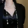 Collar Redondo Multicapa de Perlas y Cuentas Moda Temperamento Cadena para Suéter Elegante Lujo Ligero Sensación de Alta Gama Adorno de Collar Transfronterizo Europeo y Americano