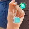 Llavero colgante de Tetris de nueve teclas de moda en colores macaron, accesorio de juguete de botón para aliviar el estrés, venta al por mayor