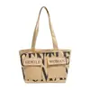 Bolso de hombro para mujer de gran capacidad, bolso tote casual para salidas, bolso de axila versátil con estampado de letras de moda, bolso de nicho y versátil