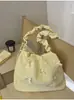 Bolsa de ombro doce e fofa em formato de laço amarelo leitoso, com design de alça de ombro franzida, uma bolsa transversal fofa para meninas