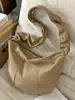 Bolsa Casual Tipo Dumpling Shuai Mi Jia para Mulheres, Novo Modelo Outono Inicial 2026, Bolsa de Ombro Simples de Cor Sólida, Bolsa Transversal Fashion para Estudantes