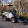 Cargador con Brazo Telescópico y Estructura Articulada, Cubo de Gran Capacidad para Manejo en Almacén, Cargador con Dirección Hidráulica