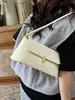 Bolso tipo baguette de nicho para mujer 2026 nuevo estilo moderno versátil celebridad de internet de moda bolso de axila estilo francés de alta gama bolso de un solo hombro