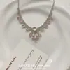 Nuevo collar y pendientes de gota de agua con diamantes brillantes de color rosa dulce, accesorios para vestidos de noche, cadena para la clavícula versátil, a la moda y de alta gama para mujeres