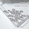 Diamante de Circonia Rosa con Base Plana para Arte de Uñas Modelo Transfronterizo de Cruz Caja de 12 Compartimentos Joyería Brillante de Circonia Rosa Claro de Tamaño Mediano para Uñas