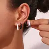 Moda Europea y Americana Sencillos de Alta Gama Pendientes de Acero de Titanio Acero Inoxidable Chapado en Oro de 18K Forma de Pera Roscados Goteo de Aceite Pendientes Pequeños para Mujeres