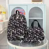 Nova Bolsa de Ombro Duplo com Estampa de Flores Borboleta Transfronteiriça Feminina Estudante Bolsa Escolar Mochila Campus Fresca Doce Conjunto de Três Peças