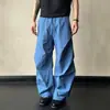 Pantalones anchos plisados de nuevo estilo minimalista para hombre 2026, cintura con cordón gris verdoso de verano, corte holgado, piernas anchas, pantalones largos casuales