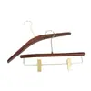 Percha para pantalones de madera maciza en color nogal negro, especialmente para tiendas de ropa, para uso doméstico y de hotel, sin marcas, antideslizante, percha con pinza de madera para pantalones al por mayor