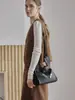 Bolso de mano de cuero genuino de moda coreano de nicho, modelo popular nuevo de comercio exterior transfronterizo 2026, bolso bandolera simple de mano