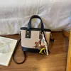 Bolsa Balde Retrô de Nicho Portátil Feminina Outono/Inverno 2026 Nova Bolsa Transversal Bordada Acolchoada com Diamantes Bolsa de Ombro Único para Trabalho e Trajeto
