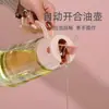 Pote de óleo com abertura e fechamento automáticos, garrafa de óleo de vidro grande para uso doméstico, garrafa de óleo e vinagre para cozinha, pote de óleo transparente, garrafa de óleo vedada à prova de vazamentos