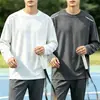 Nova camiseta masculina de manga comprida 2026, top elástico para primavera e outono, camada base pesada de corte solto, camisa masculina de manga curta