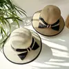 Sombrero femenino verano estilo coreano lazo grande sombrero de paja de playa viaje vacaciones protección solar sombrero para el sol sombrero de paja tejido estilo Chanel tipo cubo