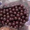 Cuentas de cinabrio de mineral crudo natural arena roja cuentas sueltas arena púrpura cuentas redondas semiacabadas arena imperial Wen juega arena dorada púrpura venta al por mayor