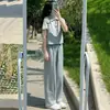 Traje esportivo de verão redutor de idade estilo francês moderno pequeno casual manga curta calça longa de perna larga conjunto de duas peças vestuário feminino