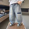 Ropa de Primavera y Otoño para Niños Pantalones de Mezclilla Estilo Coreano Versátil Atractivo para Niños Pantalones Casuales de Pierna Curva Pantalones de Otoño para Bebé Comercio Exterior