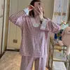 Nuevo conjunto de otoño de alta calidad de encaje de imitación de algodón con cuello en V y manga larga estilo princesa floral de doble longitud en cuadros amarillo claro