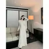 Top Tubo Estilo Delicado Colete Plissado Jaqueta Cardigã de Manga Longa Saia de Cintura Alta Conjunto de Moda Outono 2026 Feminino
