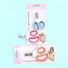 Cortauñas para gatos de corte biselado pequeño con agujero redondo, cortauñas anti-corte para mascotas, cortapelos para mascotas, tijeras para uñas de mascotas, en stock al por mayor