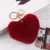 Fivela de Coração de Pelúcia Fivela de Bola de Pelo de Coração de Pêssego Pingente para Mala de Viagem de Mulher Pingente de Carro Chaveiro de Bola de Pelo de Coração Multicor