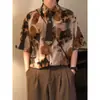 Camisa Artística Floral de Manga Curta Estilo Retro Americano Tinta Lavada para Homens e Mulheres Verão Seda Gelada Estilo de Hong Kong Solta Casual