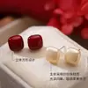 Pendientes de Plata 999 con Forma de Cubo Estilo Chino Nuevo 2026 Pendientes de Diseño de Lujo Ligero de Nicho Nuevo para Mujeres en su Año Zodiacal
