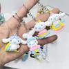 Fiesta de cumpleaños Sanrio Perro Yugui llavero colgante Caballo montando Perro Yugui llavero lindo colgante de silicona