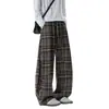 Pantalones de cuadros a bloques de color estilo retro casual 2026 de pierna ancha para hombres y mujeres, nuevos pantalones casuales versátiles de otoño e invierno de corte holgado estilo coreano de largo completo