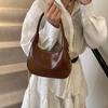 Bolso Media Luna de Piel Patentada de Moda para Mujer 2025 Nueva Llegada Elegante Nicho Versátil Bolso Cruzado Bolso Vintage para Viajero