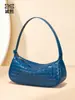 Bolsa Baguette de Venta Caliente Europea y Americana Moda Bolso de Hombro Único Debajo del Brazo Color Sólido Cuero Suave Tejido Bolso para Mujer Cruzado Bolso Dumpling Moderno