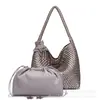 Bolso de mano tejido transfronterizo nuevo de alta gama versátil color dorado champán para mujer, gran capacidad, bolso tipo cubo para el día a día, bolso de hombro portátil