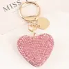 Nuevo Estilo Llavero de Aleación con Forma de Corazón Creativo Colgante para Bolso Estuche de Auriculares Incrustado con Diamantes Accesorios de Etiqueta de Metal
