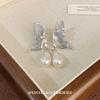 Brincos de borboleta de cristal azul Brincos exclusivos de nicho 2024 Novas explosões Brincos de pino de prata Emagrecimento de rosto redondo feminino
