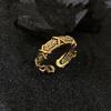 Xiang Xu, "El origen de todas las cosas", diseño antiguo de hierba Tang dorada, anillo cruzado con nicho, venta directa de fábrica de Joker.