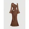 Vestido midi de gasa fina ligeramente transparente de color liso estilo chica picante con mangas acampanadas para mujer primavera y otoño transfronterizo decoración tridimensional ceñido a la cintura vestido largo de cola de pez