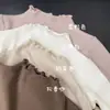 Camiseta base transpirable y amigable con la piel para niños pequeños y medianos, otoño e invierno, color liso, cuello medio alto, volantes, camiseta de manga larga para niñas, top versátil