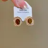 Brincos Olho de Tigre Estilo Melanoid Retro Senso de Design de Nicho Brincos Versáteis Luxo Leve Moda de Alta Qualidade Brincos de Tarraxa para Mulheres