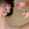 Brincos de zircônia ultra brilhantes populares do TikTok para mulheres, brincos de luxo leve de nicho de alta qualidade, estilosos e descolados, populares online, clipes de ouvido requintados