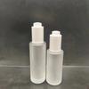 Botella de vidrio cilíndrica transparente de 30 ml con hombro plano para líquidos, aceite esencial, bomba cuentagotas blanca, envase esmerilado para cosméticos.