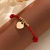Pulsera de Cuerda de Cuero Colorida Tejida a Mano de Venta Caliente Transfronteriza con Colgante de Corazón Brillante de Acero Inoxidable Pulsera Ajustable Mayoreo