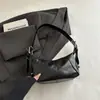 Bolsa Transfronteriza de Gran Capacidad para Mujer Otoño 2026 Nuevo Versátil Moda Hombro Único Tendencia Viaje de Negocios Retro Casual Bolsa de Mano